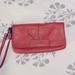 Coach Bags | Coach Coral/Peach Leather Wristlet W/ Silver | Color: Orange/Pink | Size: Wristlet