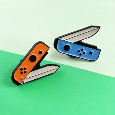 Broches en émail Orange bleu couteau de jeu de manette de jeu commutateur Nintendo poignée de jeu