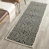 Black 27 x 0.25 in Area Rug - Wade Logan® Arneshia Geometric Sand/Indoor/Outdoor Area Rug Polypropylene | 27 W x 0.25 D in | Wayfair