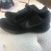 Nike Shoes | Black Nike Revolution Sneakers | Color: Black | Size: 7