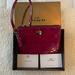 Coach Bags | Never Used Coach Cranberry Wristlet | Color: Purple/Brown | Size: Os