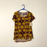 Lularoe Tops | Lula Roe Bnwt Top Classic T Xs Blouse Shirt Comfortable | Color: Purple/Yellow | Size: Xs