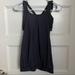 Lululemon Athletica Tops | Lululemon Athletica Black Flowy Open Sleeveless Strappy Tank Top Size 4 | Color: Black | Size: 4