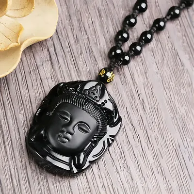 Amulette de Bouddha Shakyamuni sculptée en obsidienne noire pierre naturelle pendentif