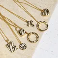 Collier pendentif en acier inoxydable Zebra Bergame Coussins Crosss Loop Circle Square Gold