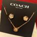 Coach Jewelry | Coach: Open Circle Necklace And Tea Rose Stud Earrings Set | Color: Gold | Size: Os