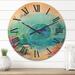 Designart 'Turquoise Ocean Spiral With Coral Reef Fishes' Nautical & Coastal Wood Wall Clock