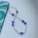 Bijoux bohèmes simples pour femmes et filles cordon anti-perte perles aux yeux bleus téléphone