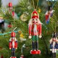 The Holiday Aisle® Nutcrackers Hanging Figurine Ornament Wood in Black/Brown/Red | 6 H in | Wayfair ED75A7BC267C44729E394B3F5E41E74C