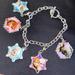 Disney Jewelry | Disney Frozen Charm Bracelet 5 Charms | Color: Blue/Pink | Size: Os