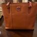 Dooney & Bourke Bags | Beautiful Dooney And Bourke Handbag In Camel - Just Like New! Comes With Cover | Color: Tan | Size: Os