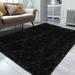 Black 23.71 x 2.39 in Area Rug - Everly Quinn Kemmi Power Loom Rectangle 2' x 3' Faux Sheepskin Area Rug/Faux Fur | 23.71 W x 2.39 D in | Wayfair