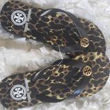 Tory Burch Shoes | Brand New!Tory Burch Shoes | Tory Burch Black Leopard Print Flip Flops | Color: Black/Brown | Size: 5