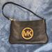 Michael Kors Bags | Michael Kors Small Wristlet With Gold Logo | Color: Black/Gold | Size: 7x4.5”