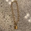 Louis Vuitton Jewelry | Authentic Louis Vuitton Lock Necklace | Color: Gold | Size: Os