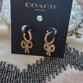 Coach Jewelry | Coach Gold Bow Earrings. | Color: Gold | Size: Os