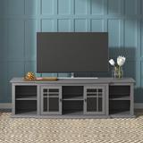 Wade Logan® Adelisa TV Stand for TVs up to 88" Wood in Gray | Wayfair DEF2E18EB44749E69755F272725E660B