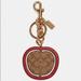Coach Accessories | Coach Spinning Apple Bag Charm In Signature Canvas | Color: Brown/Red | Size: Os