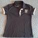 Nike Shirts & Tops | Girls Nike Golf Polo From Mistwood Golf Club | Color: Black/White | Size: Mg