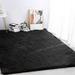 Black 94.49 x 59.06 x 2.5 in Area Rug - Everly Quinn Mamdouh Handmade Shag Faux Sheepskin Area Rug/Faux Fur | 94.49 H x 59.06 W x 2.5 D in | Wayfair