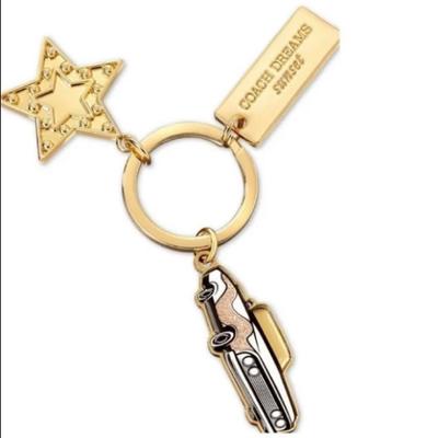 Coach Accessories | Coach Dreams Sunset Gold Tone Key Fob Pink Convertible Car Star Tag | Color: Gold/Pink | Size: Os