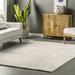 White 36 x 24 x 0.59 in Area Rug - Birch Lane™ Alvina Solid Machine Washable Shag Area Rug Polyester | 36 H x 24 W x 0.59 D in | Wayfair