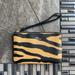 Coach Bags | Coach Corner Zip Wristlet With Tiger Print Gold/Honey/Black Multi | Color: Black/Orange | Size: Small