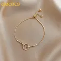 QMCOCO – Bracelet à breloques rond ajouré en cristal Zircon de couleur argent pour femmes bijoux