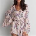 American Eagle Outfitters Pants & Jumpsuits | American Eagle Pink Floral Bell Long Sleeve Romper Size Small | Color: Pink/Purple | Size: S