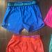 Under Armour Bottoms | 4 Pair Of Under Armor Shorts . 2 Are Reversible . Selling As A Set For $25. | Color: Blue | Size: 6g