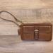 Coach Bags | Coach Tan Leather Wristlet W/Silver Accessories | Color: Silver/Tan | Size: Os