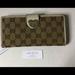 Gucci Bags | Gucci Authentic Vintage Brown/Ivory Gg Link Canvas/Leather Long Wallet | Color: Brown/Cream | Size: Os