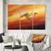 East Urban Home Running Camels During A Sandstorm - Traditional Canvas Wall Art Print Metal in Brown/Orange | 40 H x 60 W x 1 D in | Wayfair