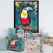 East Urban Home Toucan on the Tree Branch w/ Emerald Leaves - Print on Canvas in Green/Red | 20 H x 12 W x 1 D in | Wayfair