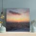 Rosecliff Heights Ocean Under Orange Sky During Sunset - 1 Piece Square Graphic Art Print On Wrapped Canvas in Black/Orange | Wayfair