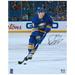 Dylan Cozens Buffalo Sabres Autographed 16" x 20" Blue Jersey Skating with Puck Photograph