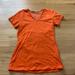 Nike Tops | Nike Dri Fit Women's Orange V Neck Athletic Slim Fit Short Sleeve Top Size Xs | Color: Orange | Size: Xs