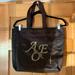 American Eagle Outfitters Bags | American Eagle Brown Satiny Tote Bag With Gold Logo Beading | Color: Brown/Gold | Size: Os
