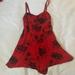 Free People Dresses | Casual / Cute Free People Red & Black Floral Romper Size 8 W Adjustable Straps | Color: Red | Size: 8