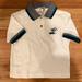 Disney Shirts & Tops | - Nwt Disney Donald Duck Golf Shirt Sz 2t | Color: Blue/White | Size: 2tb