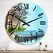 Designart 'Two Blue Fisher Boats Near Green Coast With Trees' Nautical & Coastal wall clock