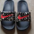 Nike Shoes | Nike Slip On Flip Flops | Color: Black/Orange | Size: 2b