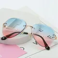 Lunettes de soleil pilote sans monture pour femmes lunettes de soleil UV400 nuances dégradées