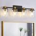 Everly Quinn 4 Light Bathroom Vanity Light, Black & Gold Bathroom Light Fixtures, Sconces Wall Lighting w/ Clear Glass Shade | Wayfair