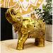 Bungalow Rose Elephant Trumpeting w/ Trunk Up Figurine Resin in Yellow | 4.5 H x 5.5 W x 2.5 D in | Wayfair 74A74F32D76E430B80C9AB1A142973DF