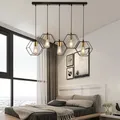 Lampes suspendues géométriques modernes à LED cadre en métal luminaire lustre créatif salon
