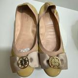 Kate Spade Shoes | Kate Spade 8.5m Slip On Ballet Flats; Beige W Bow & Gold Spade Accent At Toe | Color: Cream/Tan | Size: 8.5