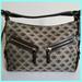 Dooney & Bourke Bags | Hp Dooney & Bourke Signature Jacquard Shoulder Bag | Color: Black/Tan | Size: Os