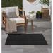 Black 0.25 in Indoor/Outdoor Area Rug - Trent Austin Design® Mullican Sandy Solid Easy Care Area Rug Polypropylene | 0.25 D in | Wayfair