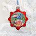 The Holiday Aisle® Dragonflies & Water Holiday Shaped Ornament Glass in Green/Red/White | 3 H x 2.5 W x 1 D in | Wayfair